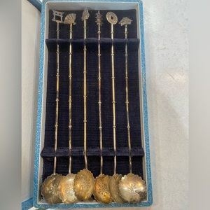 Antique silver spoons from Japan.